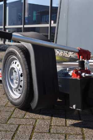 Hydraulisch verlaagbaar systeem van motortrailer